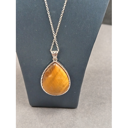 83 - Large Tiger eye pendant 3cm on 925 silver chain 44cm