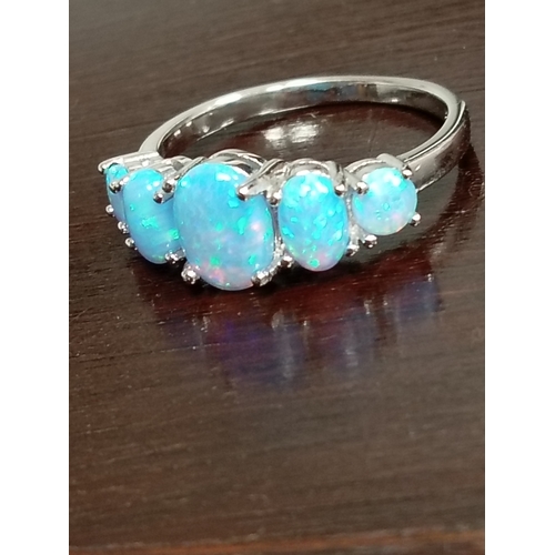 92 - Pale blue opal five stone 925 silver ring size P