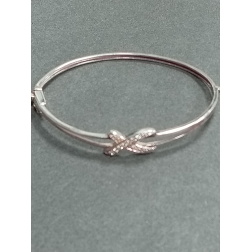 391 - 925 silver and cubic zirconia bangle 7cm diameter