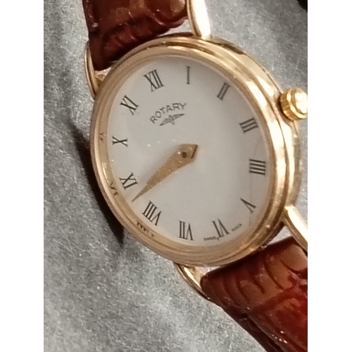 396 - 9ct gold ladies Rotary watch with brown leather strap in original box with paperwork