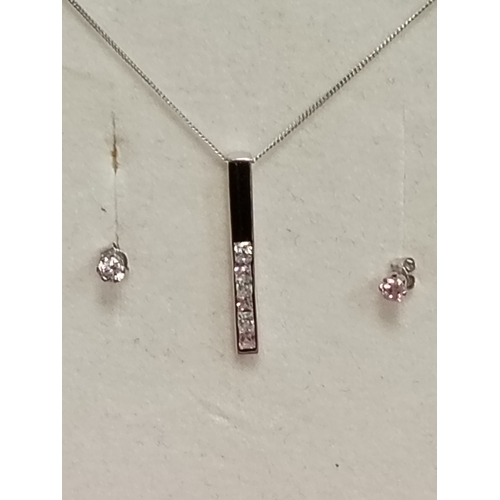 398 - 9ct white gold pink and clear gemstone pendant on chain 40cm with matching earrings boxed weight 1.2... 