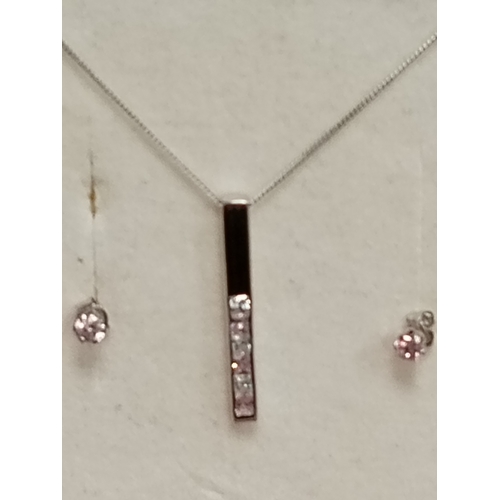 398 - 9ct white gold pink and clear gemstone pendant on chain 40cm with matching earrings boxed weight 1.2... 