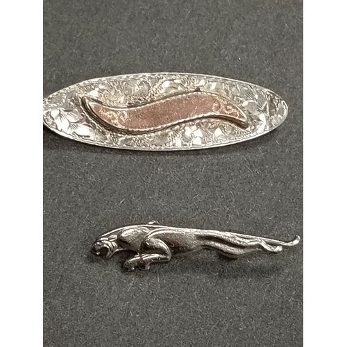 402 - Victorian hallmarked Chester silver and gold trim brooch and a white metal panther brooch