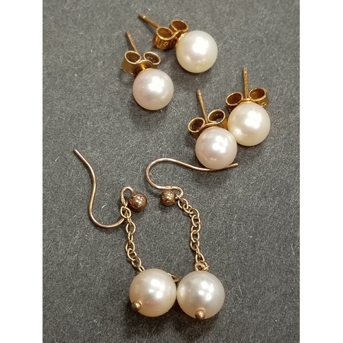 403 - Three pairs of 9ct gold and faux pearl earrings weight 4.55 grams