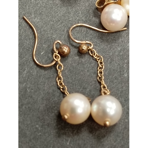 403 - Three pairs of 9ct gold and faux pearl earrings weight 4.55 grams