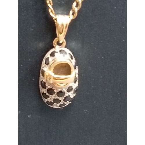 406 - 9ct gold sapphire and clear gemstone baby bootie pendant on 9ct gold chain 48cm weight 3.68 grams