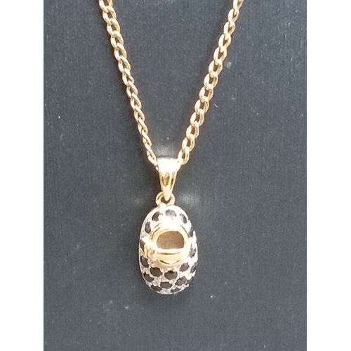 406 - 9ct gold sapphire and clear gemstone baby bootie pendant on 9ct gold chain 48cm weight 3.68 grams