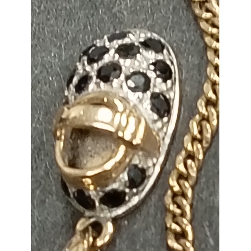 406 - 9ct gold sapphire and clear gemstone baby bootie pendant on 9ct gold chain 48cm weight 3.68 grams