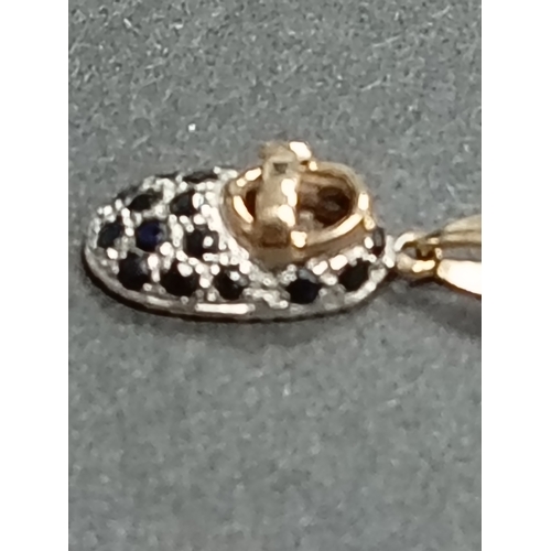 406 - 9ct gold sapphire and clear gemstone baby bootie pendant on 9ct gold chain 48cm weight 3.68 grams