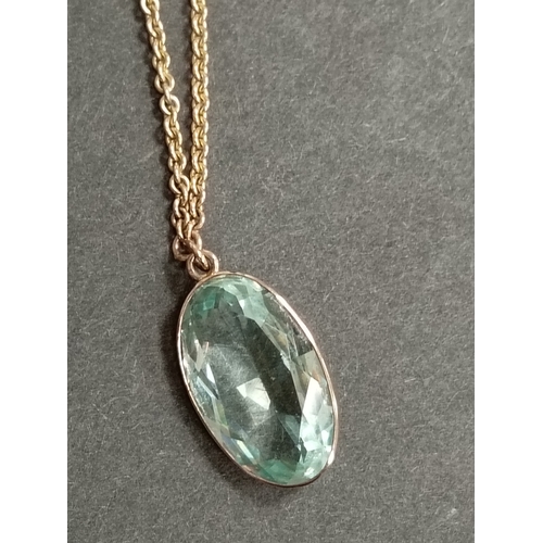 415 - 9ct gold large aquamarine coloured pendant on 40cm 9ct gold and faux pearl pendant 9.01 grams