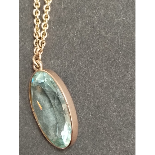 415 - 9ct gold large aquamarine coloured pendant on 40cm 9ct gold and faux pearl pendant 9.01 grams