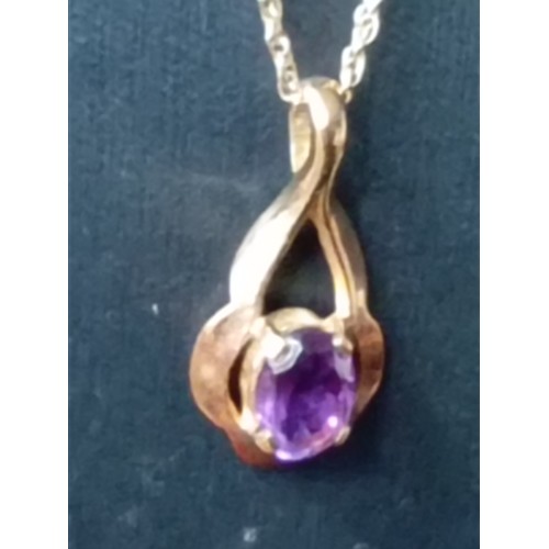 401 - 9ct gold Amethyst pendant on 9ct gold chain 48cm weight 2.64 grams