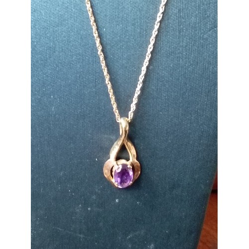 401 - 9ct gold Amethyst pendant on 9ct gold chain 48cm weight 2.64 grams