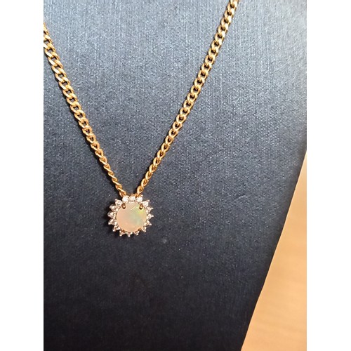 407 - 9ct gold Opal and diamond pendant on 9ct gold chain 40cm weight 2.81 grams