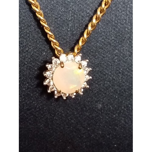 407 - 9ct gold Opal and diamond pendant on 9ct gold chain 40cm weight 2.81 grams