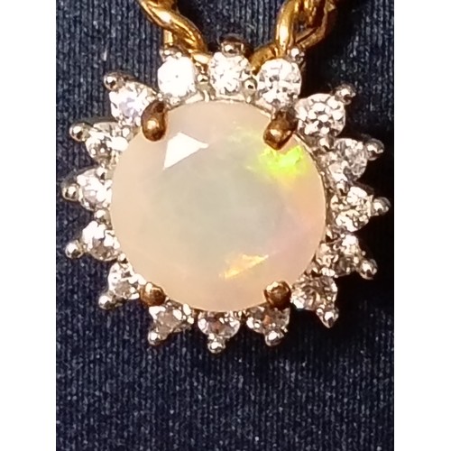 407 - 9ct gold Opal and diamond pendant on 9ct gold chain 40cm weight 2.81 grams