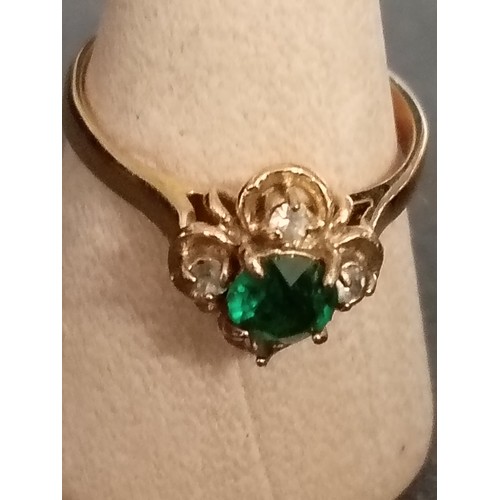 409 - Marked 14c gold green and clear stone ring size N weight 1.82 grams