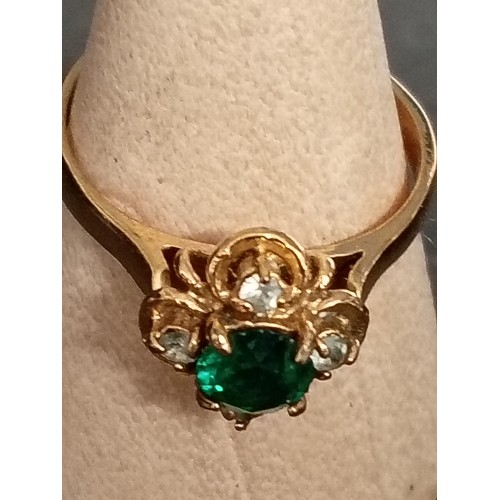 409 - Marked 14c gold green and clear stone ring size N weight 1.82 grams