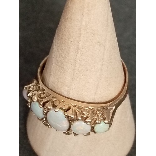 414 - 9ct gold and five opal ring size O weight 2.71 grams