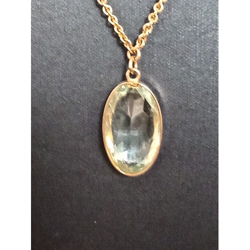 415 - 9ct gold large aquamarine coloured pendant on 40cm 9ct gold and faux pearl pendant 9.01 grams