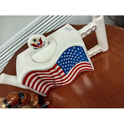 12 - American flag teapot by Seymour Mann Inc and a time is money telephone moneybox by Royal Bradwell wa... 