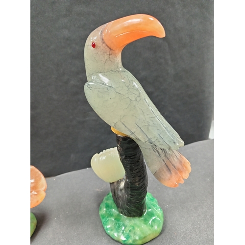 14 - Pair of hand carved gemstone tropical birds on flower stems H 20cm x W 10cm