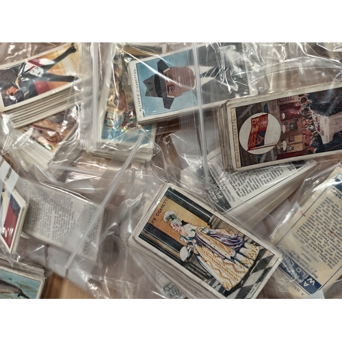 17 - Complete sets of vintage cigarette picture cards and Two albums includes flowers, cars, movie stars ... 