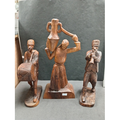 66 - Three vintage hand carved ethnic figures