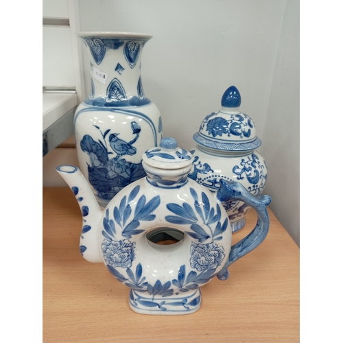 72 - Three pieces of Oriental blue and white ceramics includes vase, ginger jar and teapot