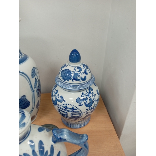 72 - Three pieces of Oriental blue and white ceramics includes vase, ginger jar and teapot