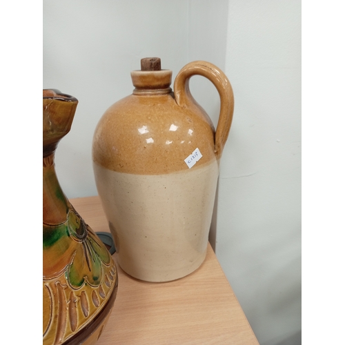 73 - Stoneware Victorian salt glazed flagon H 30cm x W 18cm and German ceramic pitcher A/F H 25cm x W 17c... 