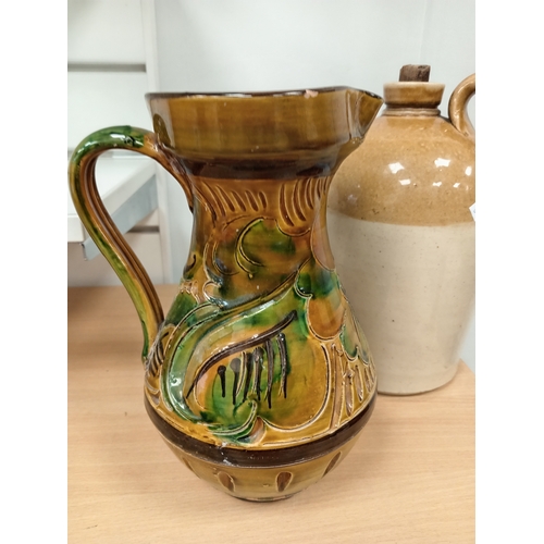 73 - Stoneware Victorian salt glazed flagon H 30cm x W 18cm and German ceramic pitcher A/F H 25cm x W 17c... 