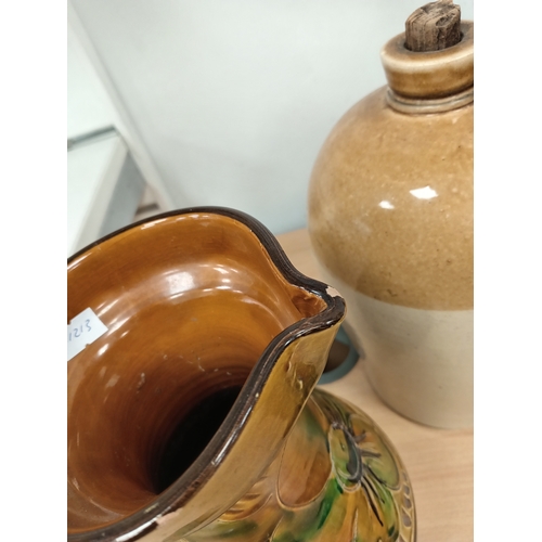 73 - Stoneware Victorian salt glazed flagon H 30cm x W 18cm and German ceramic pitcher A/F H 25cm x W 17c... 