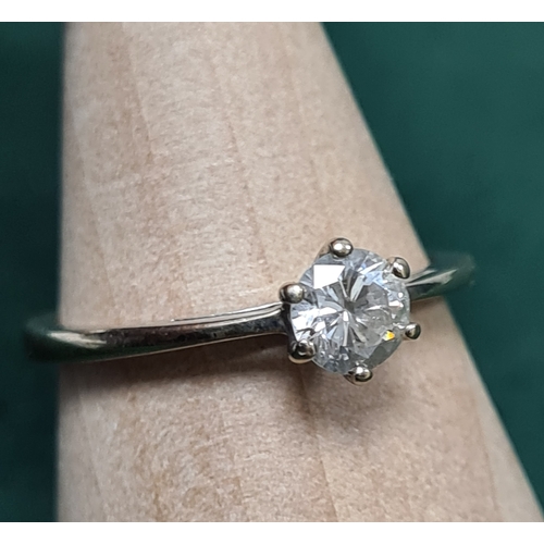 321 - 0.4 carat Diamond solitaire ring set in 18 carat white gold. Size K 1.9 grams.