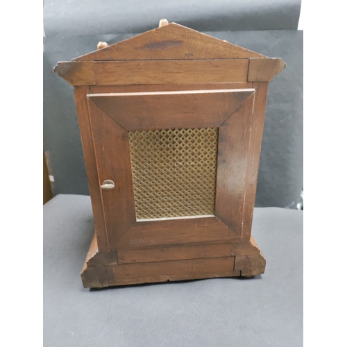 405 - Antique Oak In layed Mantel Clock complete with pendulum and key.