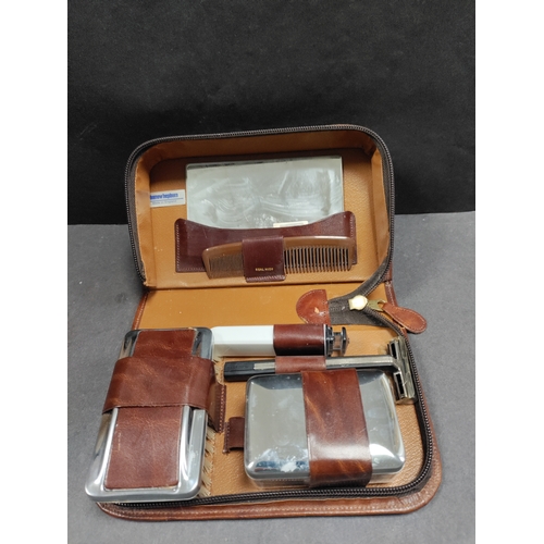 406 - Set of four gents leather and pigskin grooming kits