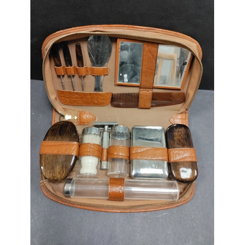 406 - Set of four gents leather and pigskin grooming kits