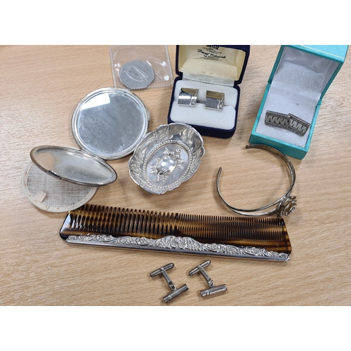 408 - Collection of Silver items to include a compact; comb; 2 pairs of cuff links and a bangle. Plus othe... 