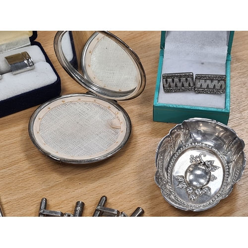 408 - Collection of Silver items to include a compact; comb; 2 pairs of cuff links and a bangle. Plus othe... 