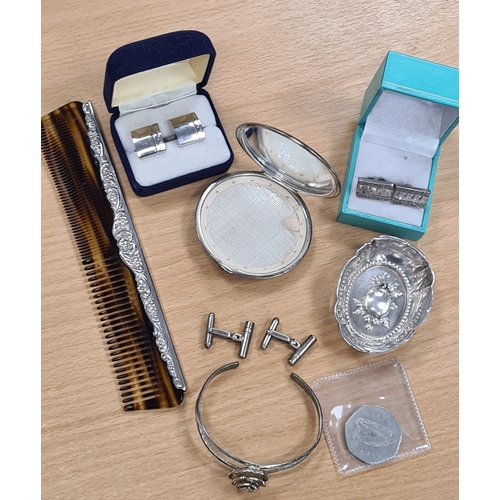 408 - Collection of Silver items to include a compact; comb; 2 pairs of cuff links and a bangle. Plus othe... 