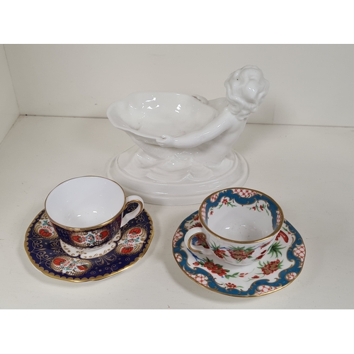 411 - Royal Worcester china Cherub Soap Dish and two decoratied miniature cup & saucers. Dish measures H10... 