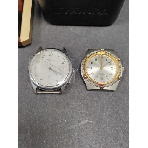 650 - Job lot of watches and a mid century alarm clock. Brands include Sekonda and Pulsar.