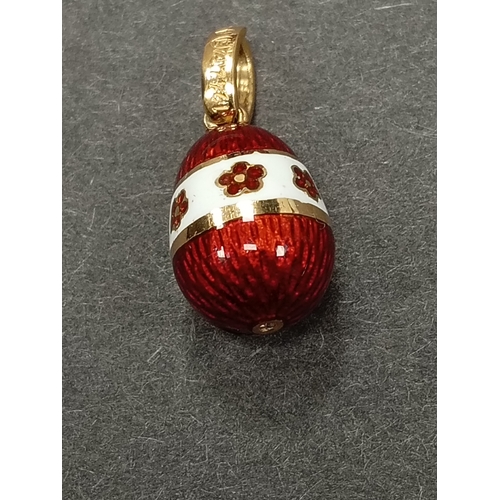 663 - Imperial collection Tatiana Faberge 18 k Gold 0.005 ct diamond enamelled egg pendant. Model number 1... 