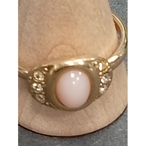 673 - Yellow metal pink coral and diamanté stone ring size V