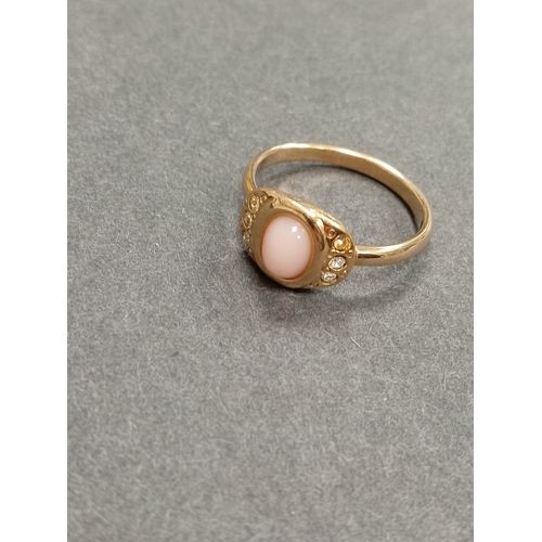 673 - Yellow metal pink coral and diamanté stone ring size V