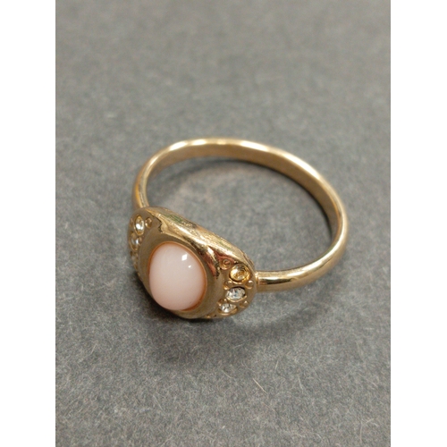 673 - Yellow metal pink coral and diamanté stone ring size V