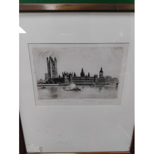 429 - A trio a framed lithographs signed by an unknown artist. The scenes include the houses of parliament... 