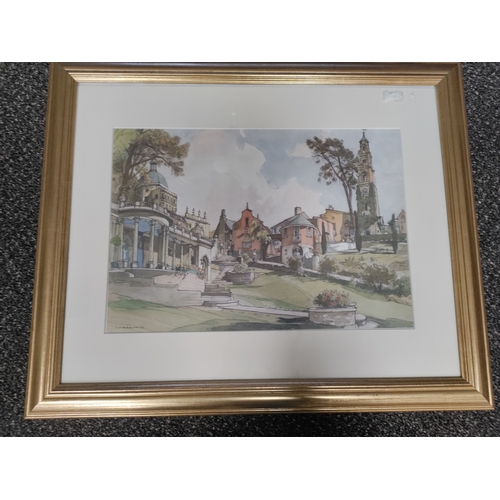 431 - A framed print of a water colour of Portmeirion by F.W. BALDWIN. H 47cm x W 57cm