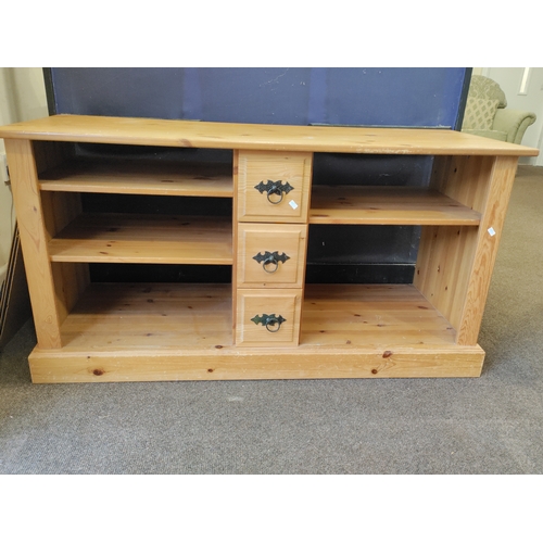 436 - Pine Sideboard with shelves and draws for cds in centre. H 65cm x W 126cm x D 49cm