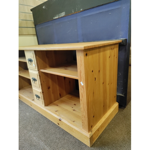 436 - Pine Sideboard with shelves and draws for cds in centre. H 65cm x W 126cm x D 49cm